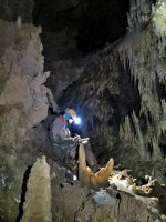 H surveying ongoing passage in Satans Chode.jpg