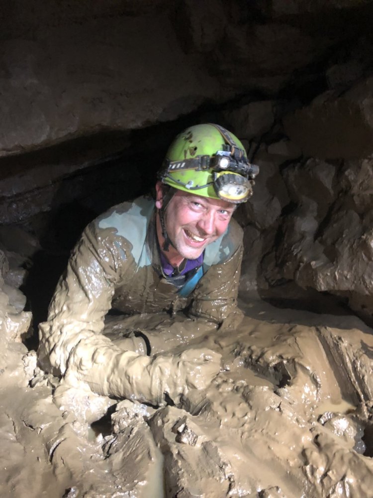 Hal in Mud in cave.jpg
